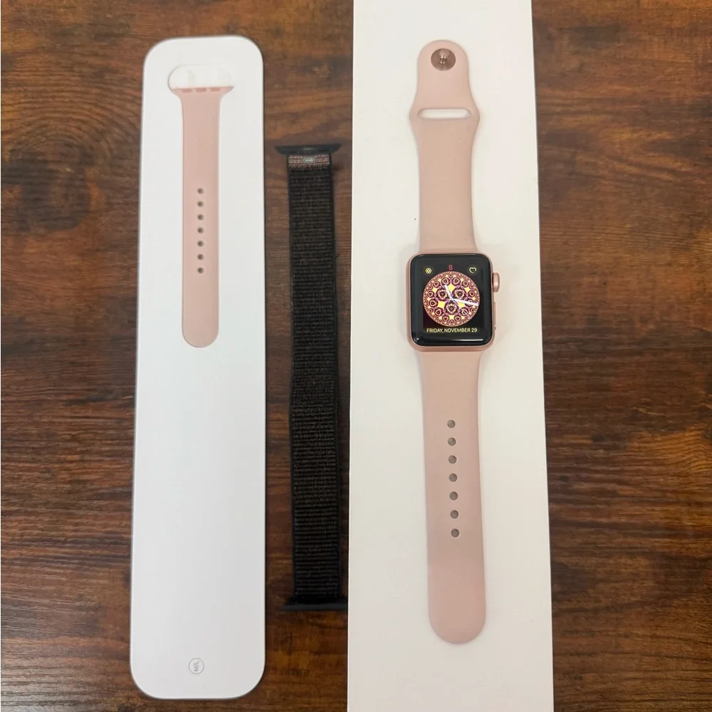 Apple Watch Series 3 with Pink and Black Bands